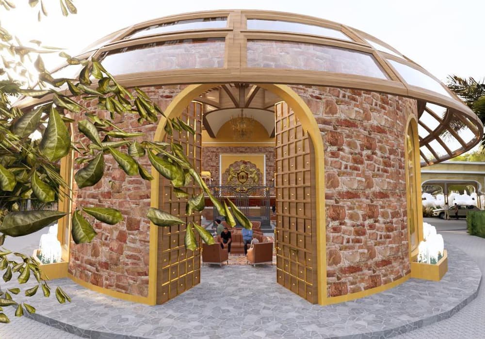 Circular stone reception lounge crowned by a glass dome with brass lattice doors